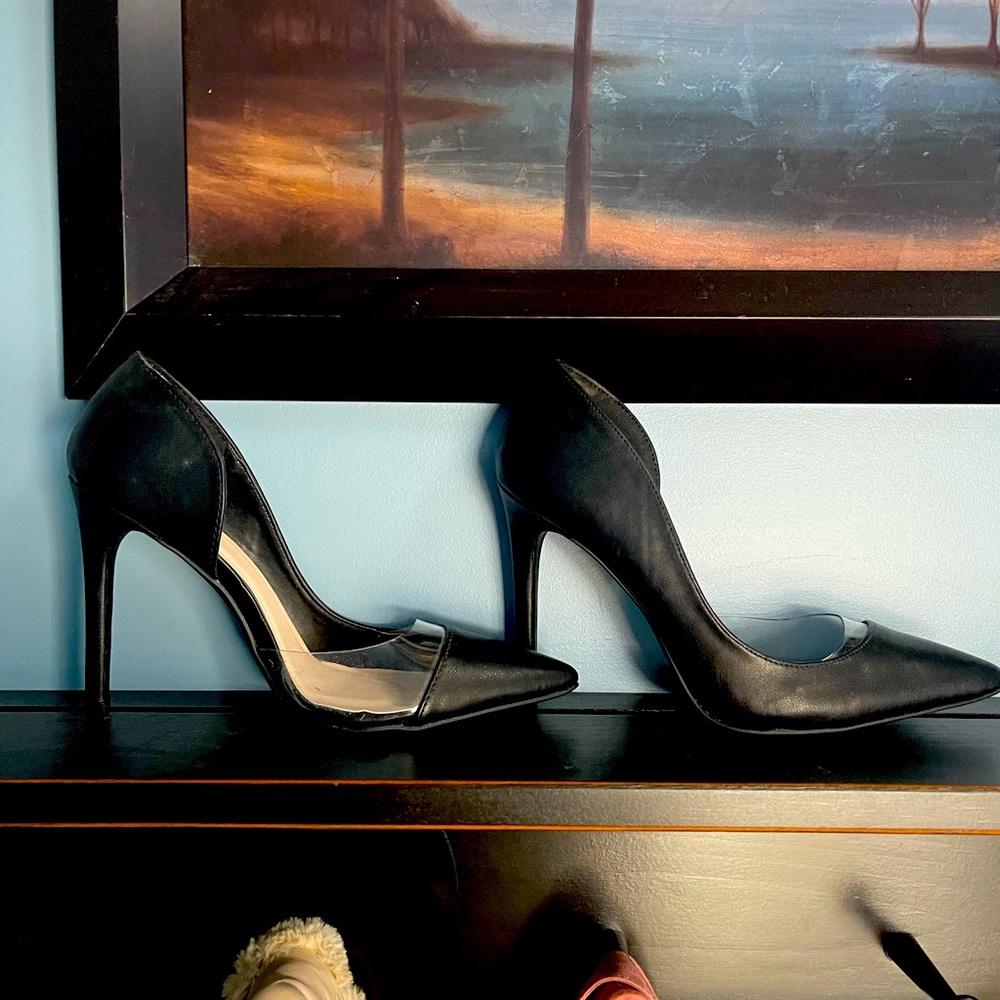 Never worn black and plastic high heels
